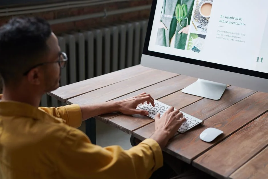 A contemporary workspace showcasing a laptop, tablet, and smartphones, ideal for tech and freelance use.